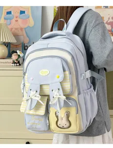 Cute bunny ears school backpack for teen girls, light blue college style double shoulder bag.