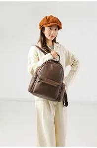Close-up view of the soft PU leather backpack, showing detailed texture and large capacity.