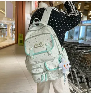 Mint green star pattern student backpack with multiple pockets and cute star pendant casual bag