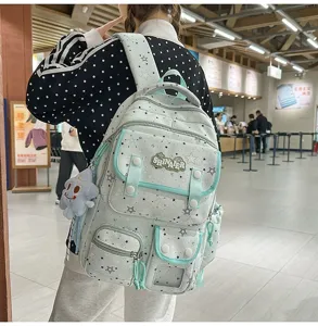 Mint green starry backpack for students, casual lightweight travel school bag with multi pockets.