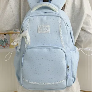 Sweet light blue star print school backpack with cute white lace trim for daily student use.