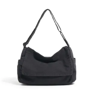 Classic black canvas messenger bag for casual daily use, adjustable shoulder strap, durable.
