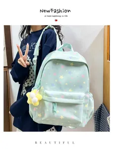Light blue star print backpack for teen girls, cute aesthetic school bookbag with multi pockets.