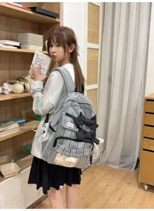 Chic plaid backpack with cute bows and transparent front pocket, perfect for daily school and travel.