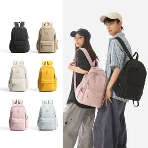 Nylon casual backpack detail view showing multiple vibrant colors and model wearing.