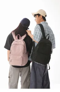 Casual nylon backpack scene showcasing dual colors and large capacity daily school bag.