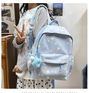 Ice blue star print school backpack for teen girls, multi-compartment casual daypack.