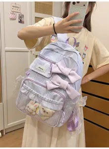 Sweet pastoral plaid backpack with cute bows and plush toys, ideal for students and daily travel.