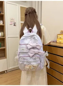 Sweet pastoral style striped school backpack with cute bows and plush toys for daily use.