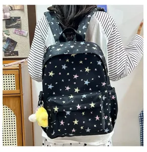 Casual black star print canvas backpack with multi-compartments and cute plush pendant.