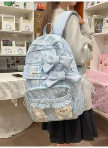 Light blue plaid school backpack with cute bows and plush toys, sweet pastoral style daypack.