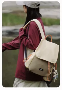 Casual outdoor dual-shoulder backpack, stylish colorblock design with durable drawstrings.