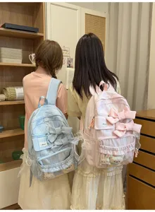 Pastoral style plaid backpack with cute big bow and transparent front pocket for daily school use.