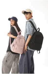 Stylish waterproof nylon backpack for teens, large capacity casual school bag for daily use.