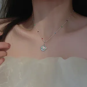 Geometric rainbow heart pendant necklace for women elegant clavicle chain jewelry item.