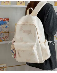 Cute bear print canvas backpack for daily commuting, large capacity casual school bag.