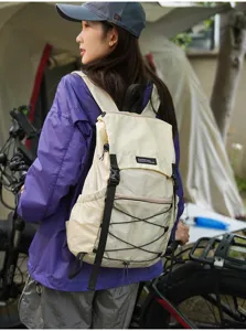 Ultralight outdoor hiking backpack for women, portable travel daypack for summer.