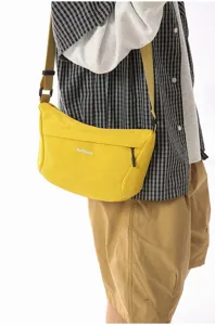 Elegante bolso bandolera de nailon amarillo para hombres y mujeres, bolso de pecho casual.
