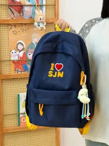 Dark blue school backpack, American campus style casual bookbag with cute charm.