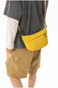 Bolso cruzado de nailon amarillo elegante para hombre y mujer, bandolera de cadera.