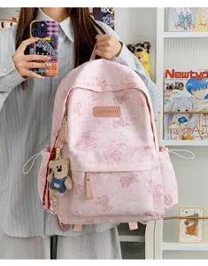 Pink tie-dye backpack with cute bear pattern, large capacity daily school bag for women.