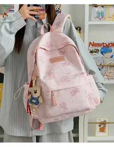 Pink tie-dye cute bear canvas backpack with large capacity for women and men daily commute.
