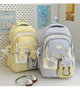 Kawaii rabbit ear school backpack with ribbon bows and transparent pocket cute student book bag.