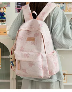 Pink tie-dye canvas backpack for students, cute bear pattern casual daypack with large capacity.