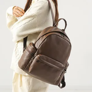 Women's PU Leather Casual Backpack Large Capacity Travel School Bookbag Minimalist Daypack with Pom Pom Pendant