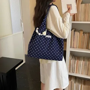 Navy blue polka dot canvas shoulder bag with pearl charm, casual aesthetic everyday tote bag.