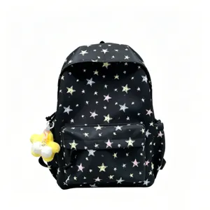 Black star print school backpack with cute plush charm, casual daypack for student daily commute