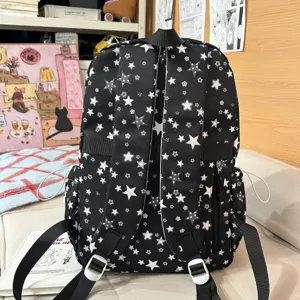 Black star pattern backpack for women and students, casual commuter school bag with multi-pockets.