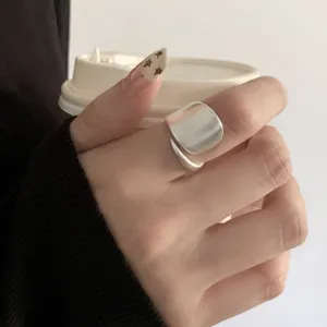 Matte silver geometric open ring detail, minimalist wide wrap band for fashion daily wear.