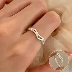 Minimalist silver wave textured double ring, adjustable open ring for chic daily wear.