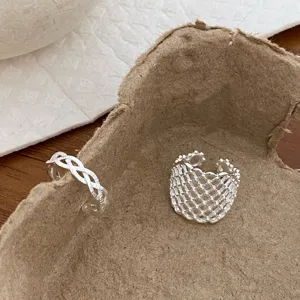 Stunning silver mesh and braided open rings detail, perfect stackable minimalist jewelry design.