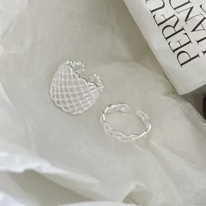 Silver geometric hollow grid and twisted open ring set, minimalist stackable jewelry.