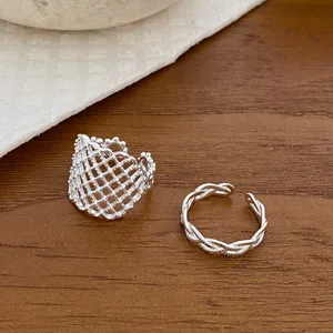 Silver open mesh and twisted rings set, minimalist geometric stackable finger jewelry.