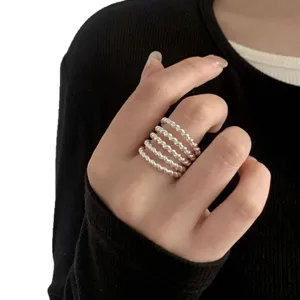 Silver multi-layer twisted ring for women, trendy open band indie design for index finger.