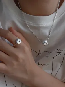 Square smiley face bead necklace and ring set, minimalist silver metal fashion jewelry.
