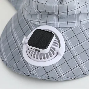 Close-up detail of the grey plaid sun hat featuring a built-in solar powered mini cooling fan.