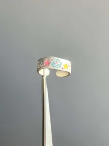Colorful enamel graffiti open ring featuring cute cartoon bear and star designs for women.