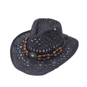 Detailed view of black hollow western straw hat featuring wooden beads and turquoise decor.