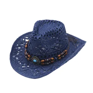 Dark blue hollow western cowboy straw hat detail with beads for summer sun protection.