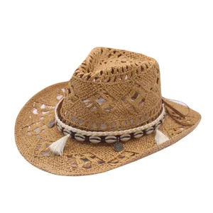 Hollow straw cowboy hat with shells and tassels for spring and summer outdoor sun protection.