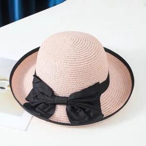 Sombrero de paja de sol de verano para mujer con elegante lazo negro y ala ancha para la playa.