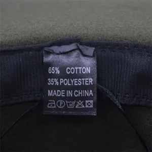 Vue détaillée de l'étiquette d'entretien intérieure indiquant une composition de 65% de coton.