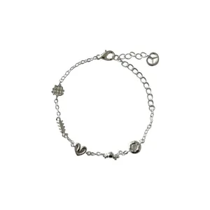 Silver multi-charm bracelet with cute donut, heart and waffle pendants, trendy wrist jewelry.
