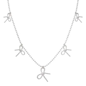 Dainty silver bead chain necklace with multiple sweet bowknot charms, stylish clavicle chain.