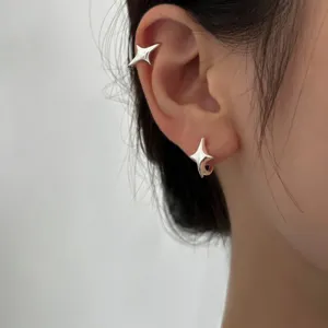 Minimalistische zilveren ster oorbellen en oorklemmen, chique mode sieraden voor dames.