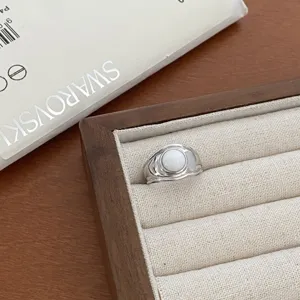 Silver geometric open ring with white stone, retro vintage style fashion finger jewelry.